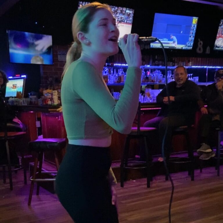 Girl sings karaoke at Banter Bar West Los Angeles